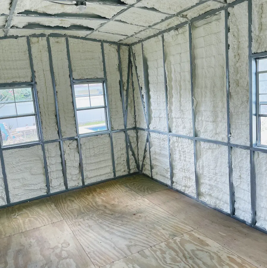 Closed-cell spray foam insulation applied to wall cavities in a residential project in Tinley Park